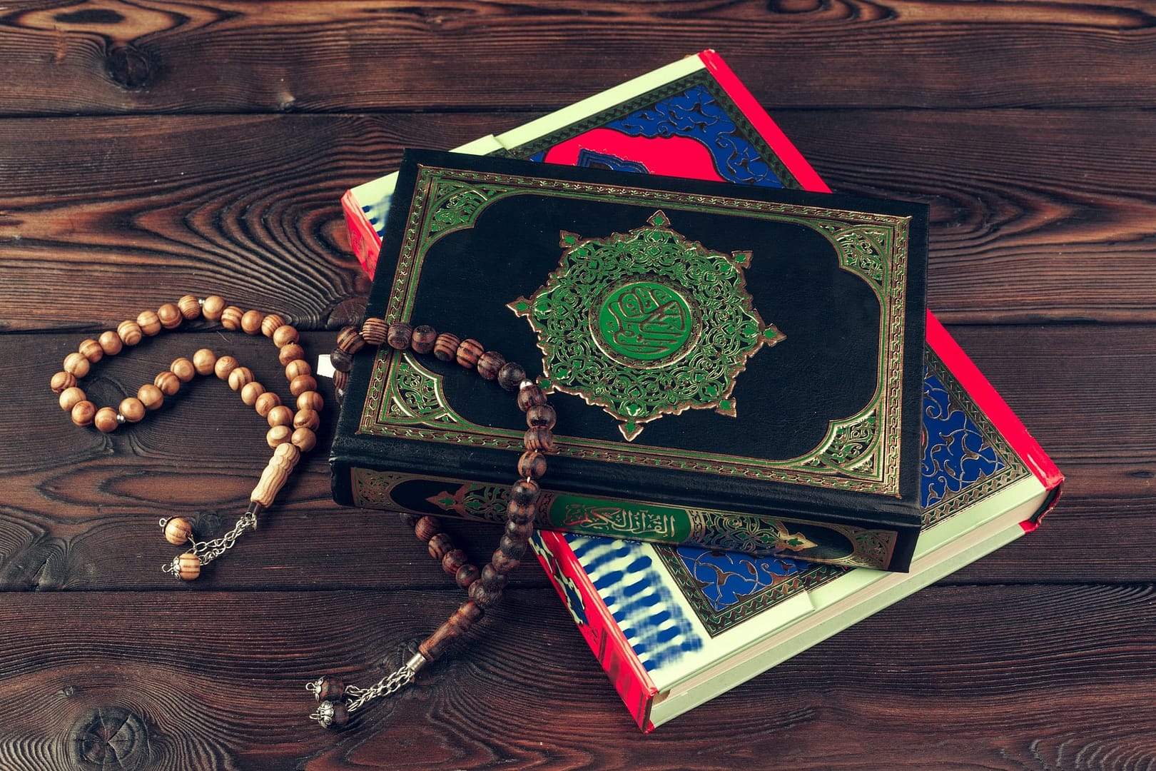 islamic holy book on wooden table
